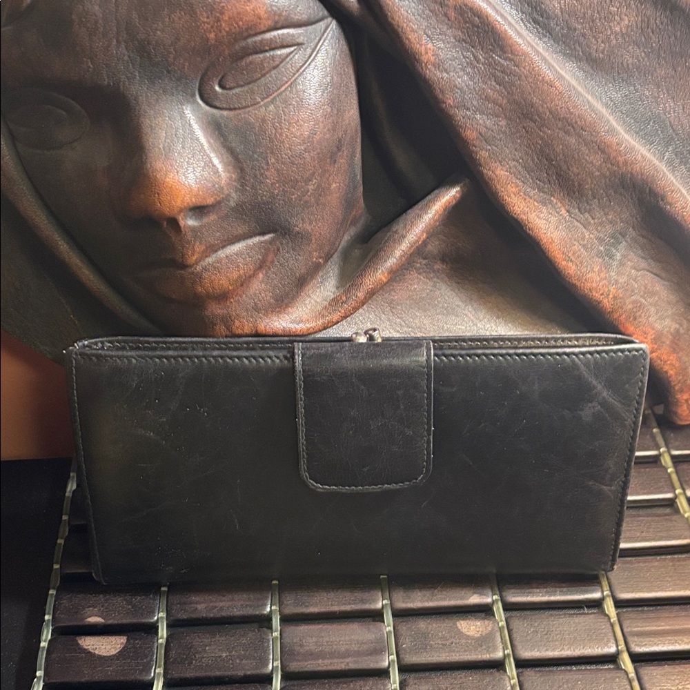 Vintage Black Leather Wallet-holds $ cards used make offers.